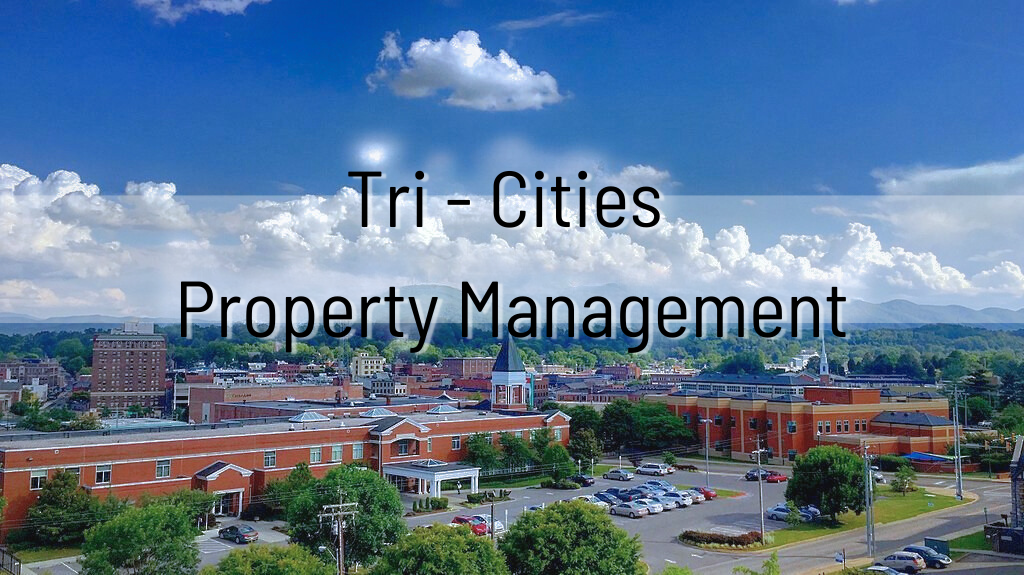 Photo of downtown Johnson City, Tennessee with Tri-Cities Property Management written across it in black text